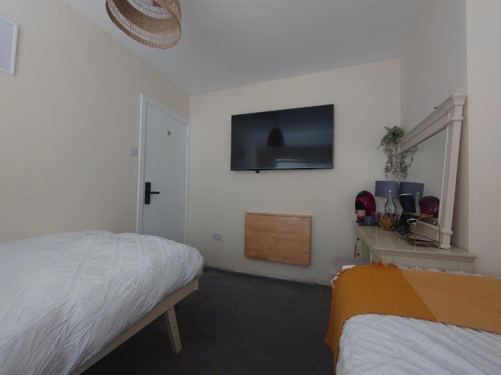 Postel nebo postele na pokoji v ubytování Grand Canal Private Rooms
