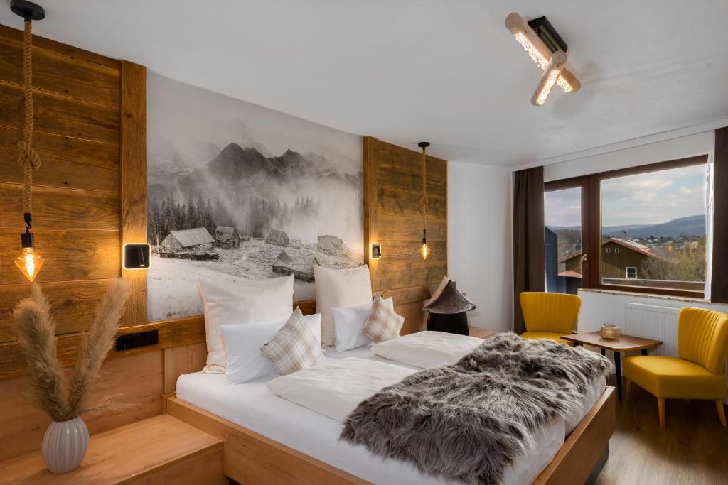 Postel nebo postele na pokoji v ubytování Landhotel Magdalenenhof GbR