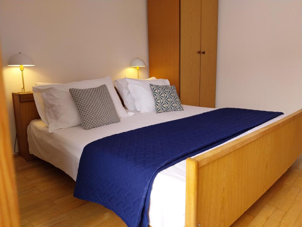 Postel nebo postele na pokoji v ubytování Apartments Miodrag