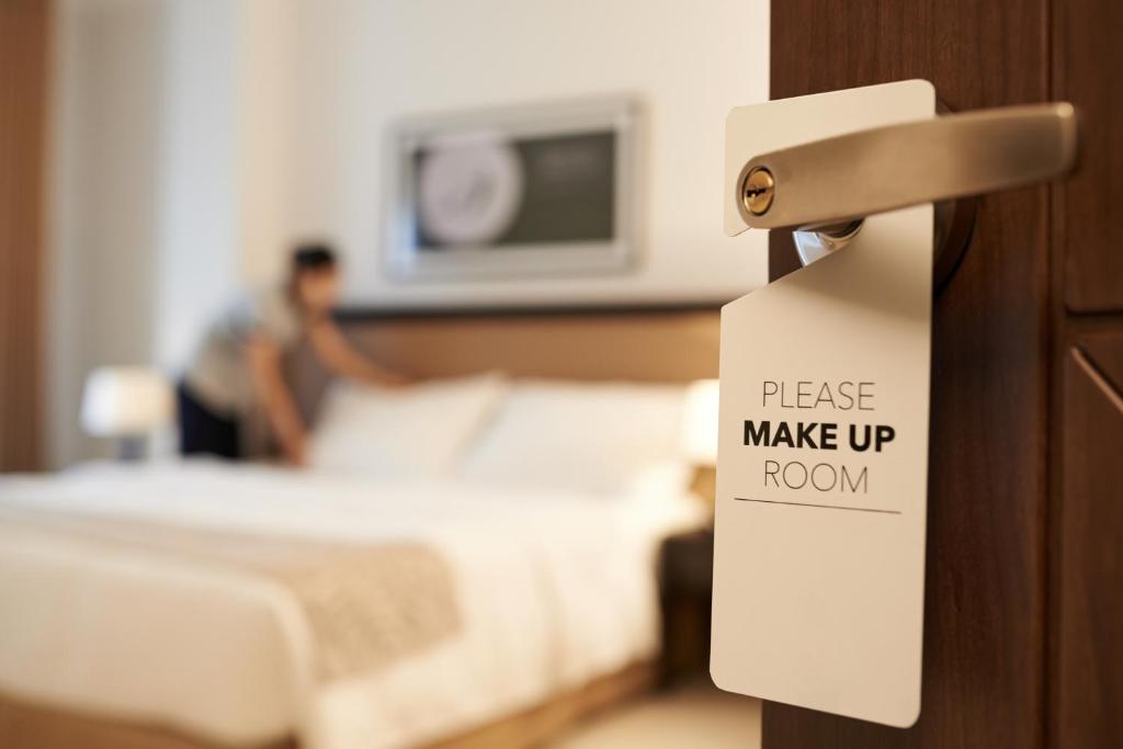 Postel nebo postele na pokoji v ubytování RG Boutique Hotel