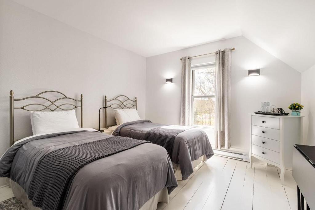 Postel nebo postele na pokoji v ubytování B&B Hillhouse
