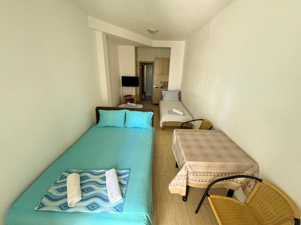 Postel nebo postele na pokoji v ubytování Biser Apartmani