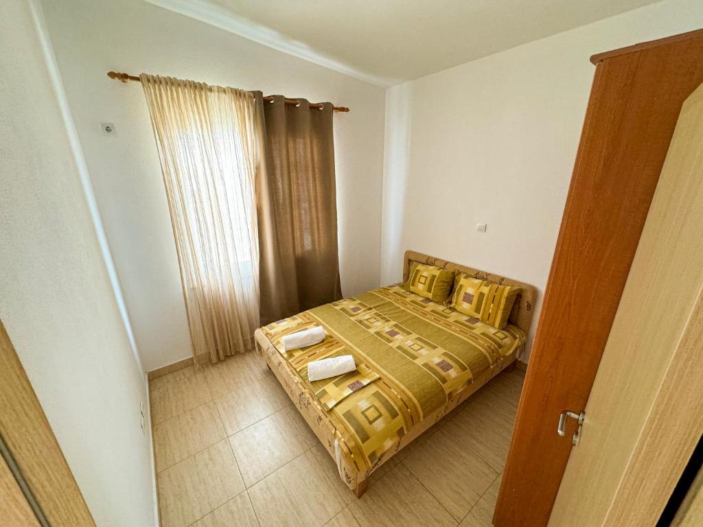 Postel nebo postele na pokoji v ubytování Biser Apartmani