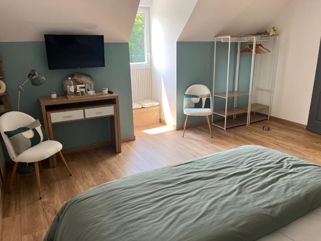 Postel nebo postele na pokoji v ubytování La Tour Carrée