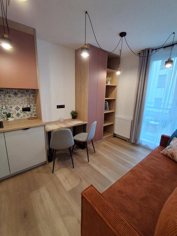 Η κουζίνα ή μικρή κουζίνα στο Hola Apartamenty Nawrot