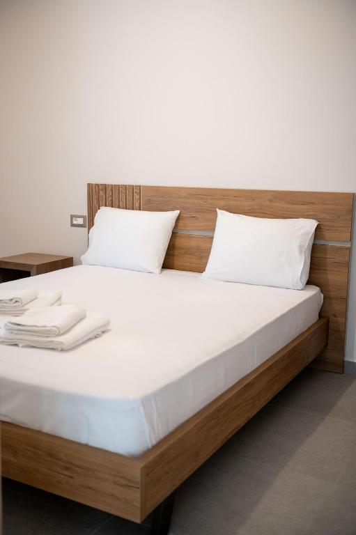 Postel nebo postele na pokoji v ubytování Raptis Apartments