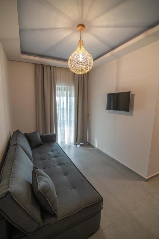 TV a/nebo společenská místnost v ubytování Raptis Apartments