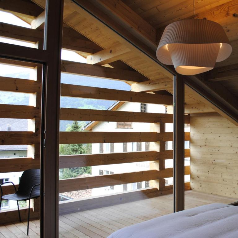 Postel nebo postele na pokoji v ubytování Boutique Hotel Casa Giovanoli