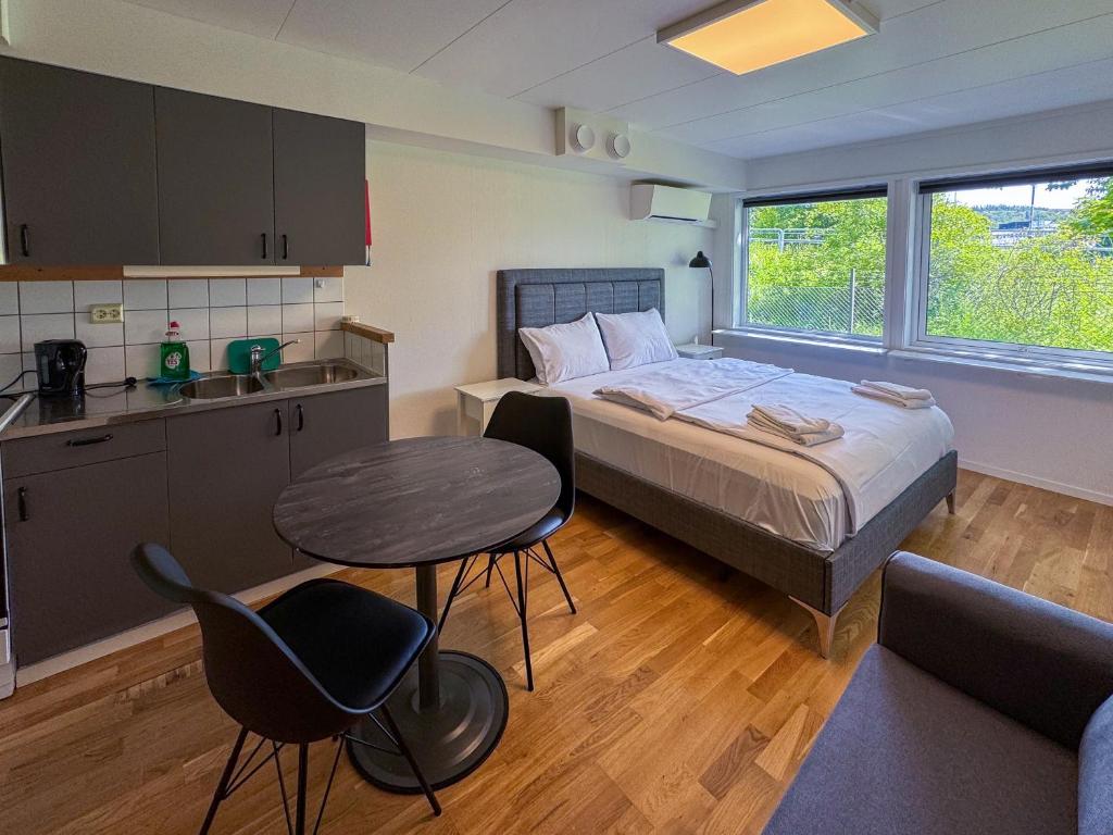 Kuchyň nebo kuchyňský kout v ubytování Jönköping Hotel Apartments