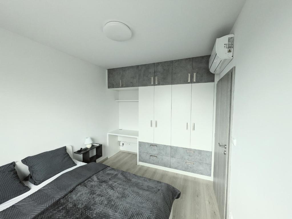 Postel nebo postele na pokoji v ubytování Apartman Amanda - Ohrada