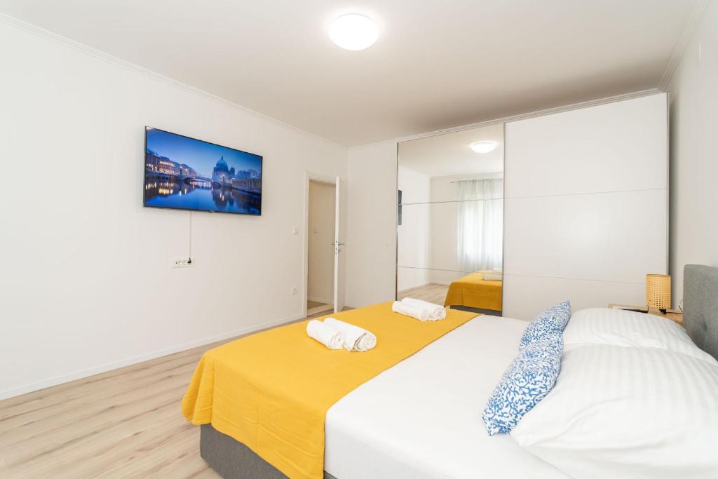 Postel nebo postele na pokoji v ubytování Villa Three Olives