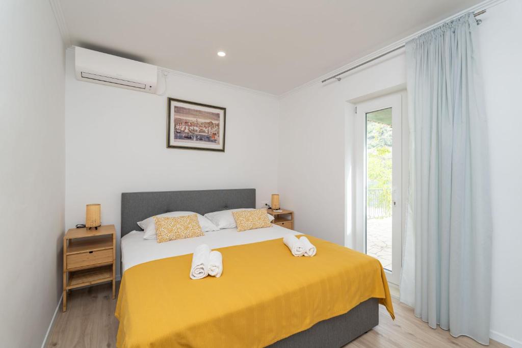 Postel nebo postele na pokoji v ubytování Villa Three Olives