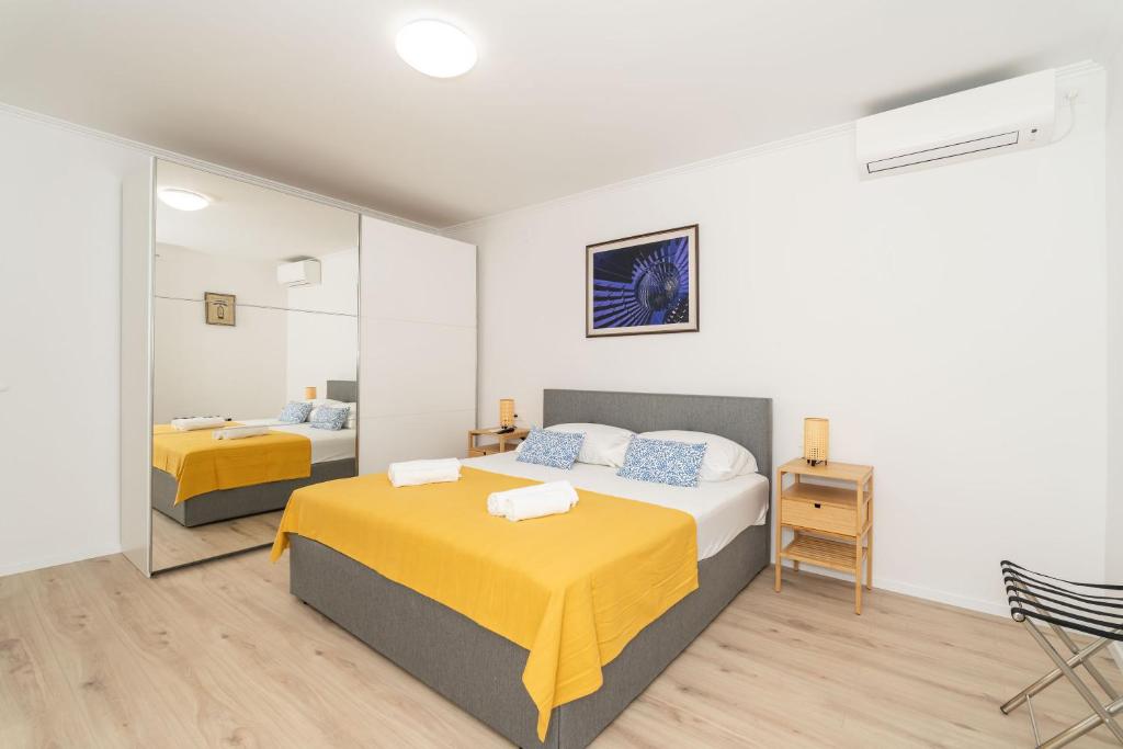 Postel nebo postele na pokoji v ubytování Villa Three Olives