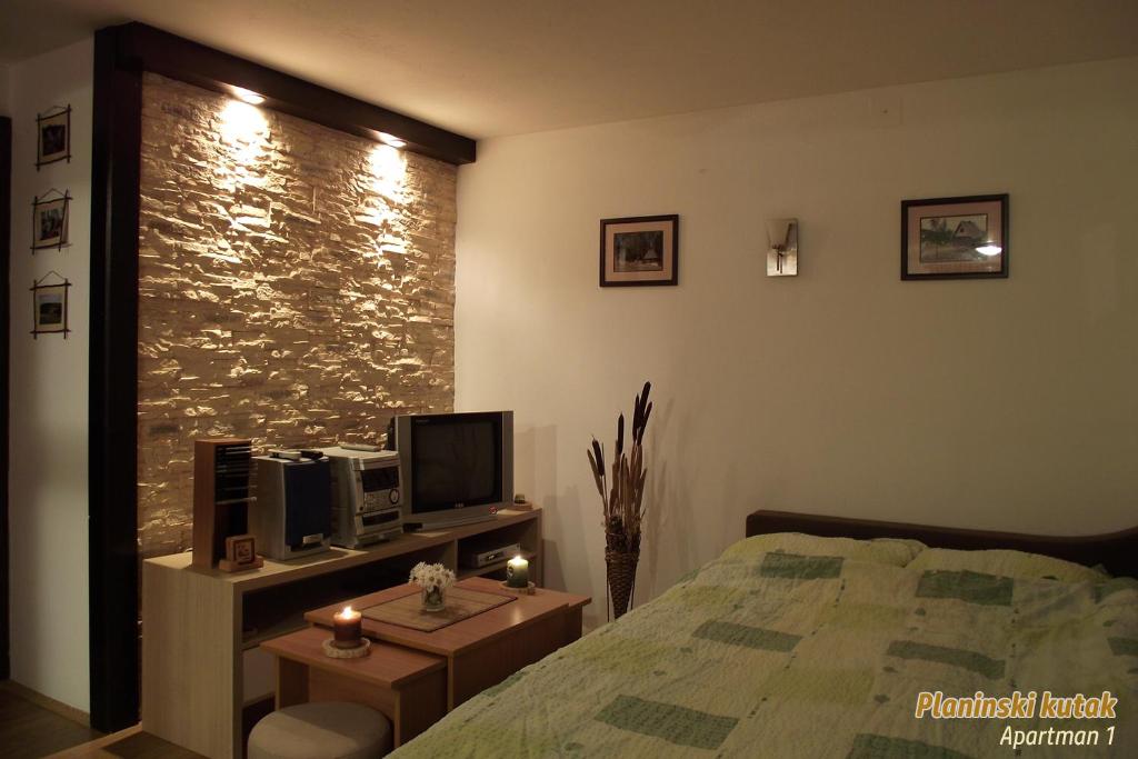 Postel nebo postele na pokoji v ubytování PLANINSKI KUTAK Tara - Apartman 1