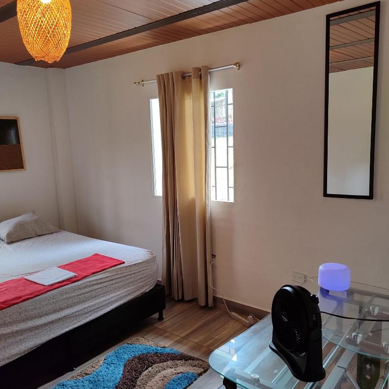 Postel nebo postele na pokoji v ubytování Maracuya Hostel