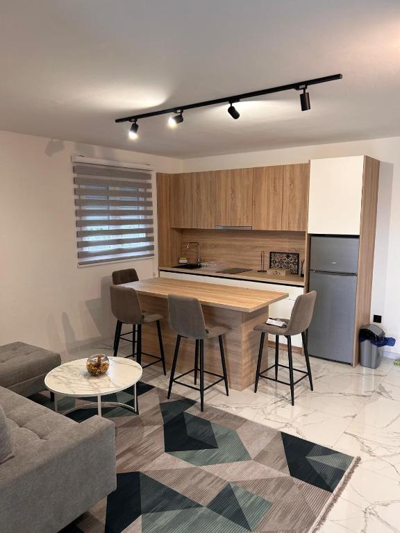 Kuchyň nebo kuchyňský kout v ubytování Apartmani Stars