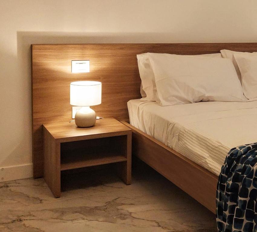 Ένα ή περισσότερα κρεβάτια σε δωμάτιο στο City Apartment - Il Ghiro