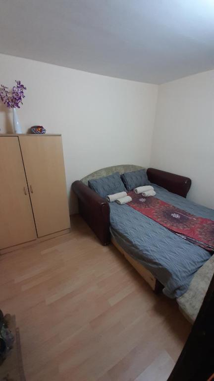 Postel nebo postele na pokoji v ubytování Vikendica Aleksandar