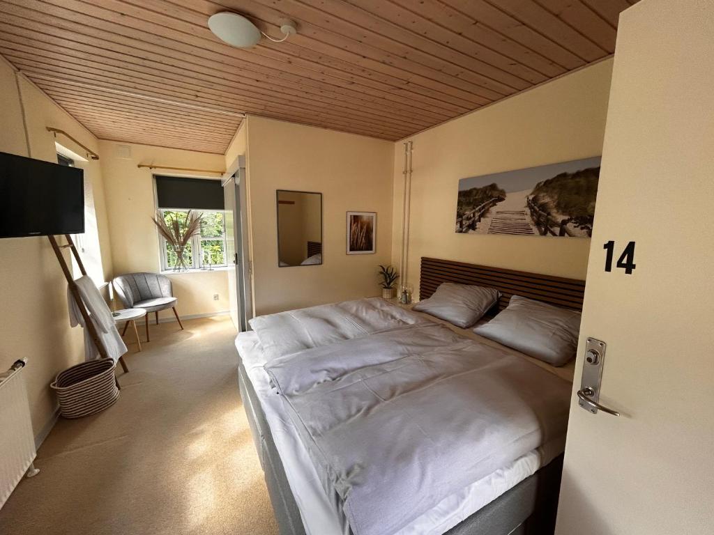 Postel nebo postele na pokoji v ubytování Strandidyl Bed and Breakfast