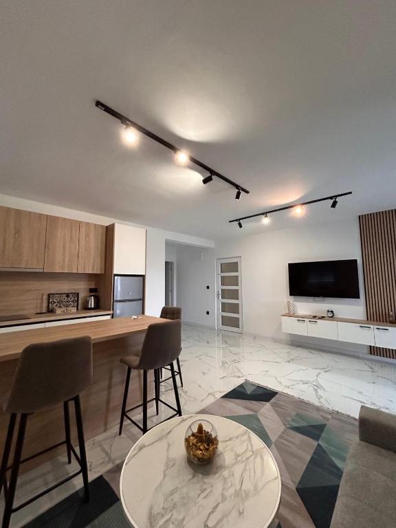 Kuchyň nebo kuchyňský kout v ubytování Apartmani Stars