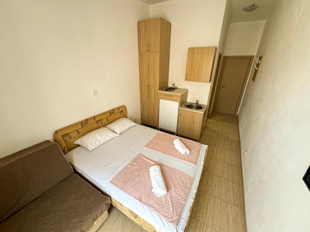 Postel nebo postele na pokoji v ubytování Biser Apartmani