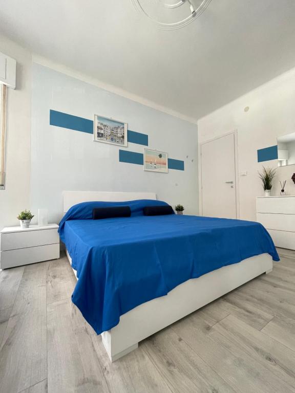 Ένα ή περισσότερα κρεβάτια σε δωμάτιο στο Casa Ferruccio - Parking - Air Conditioning - WiFi