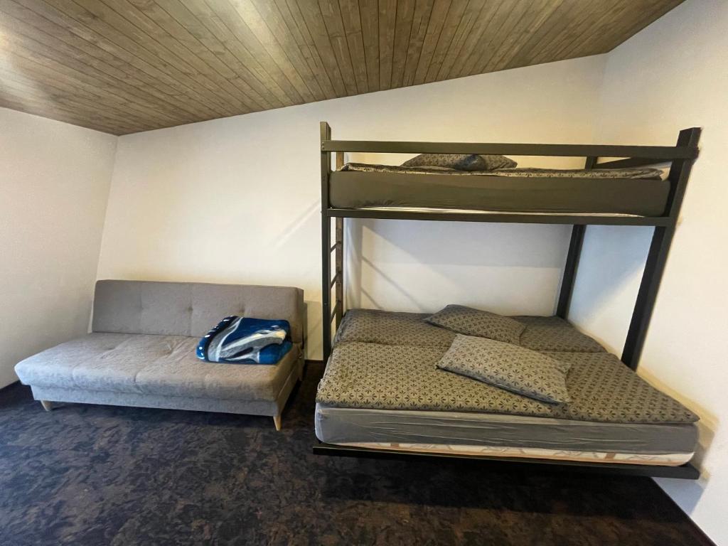 Postel nebo postele na pokoji v ubytování OZONE