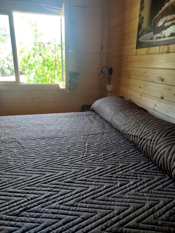 A bed or beds in a room at Choco B&B