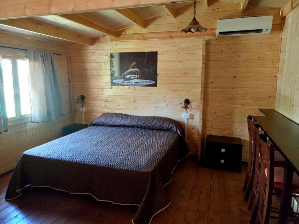 A bed or beds in a room at Choco B&B