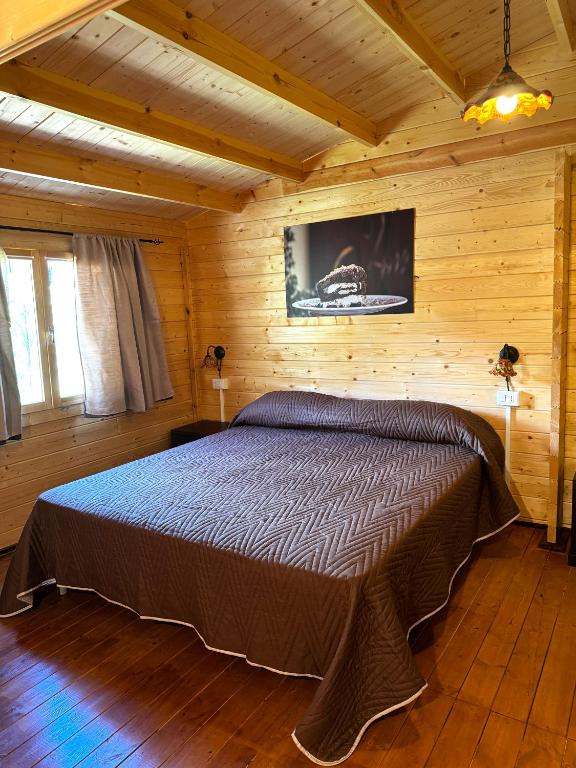 A bed or beds in a room at Choco B&B