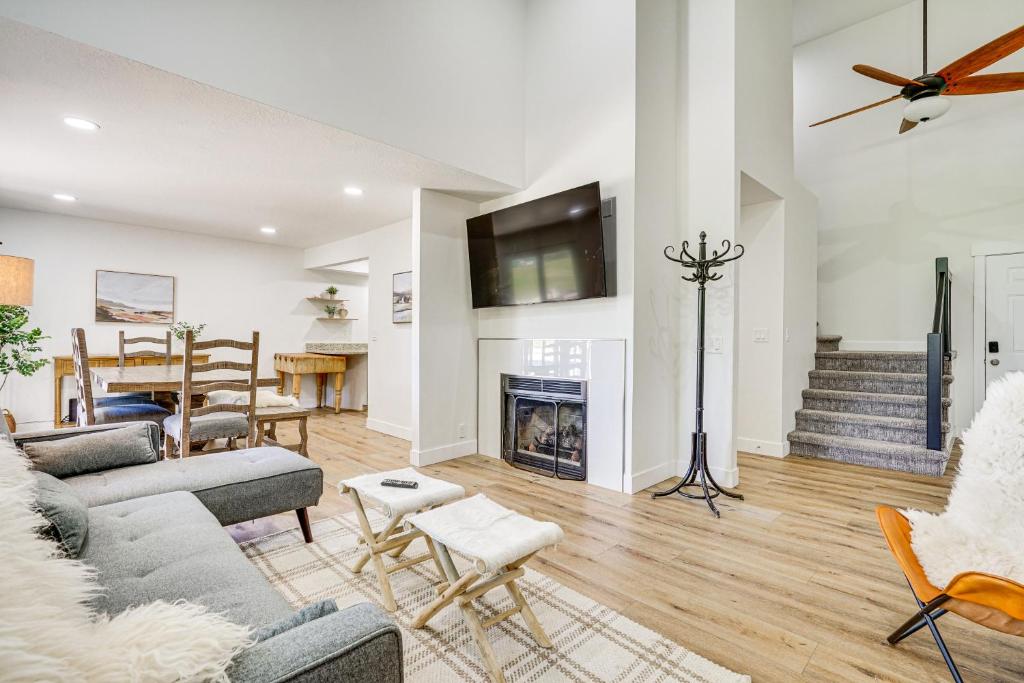 a living room with a couch and a fireplace at Cottonwood Heights Escape Near Hiking and Skiing in Cottonwood Heights