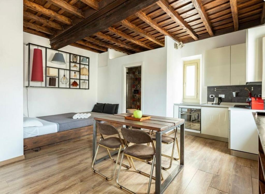 A kitchen or kitchenette at Colosseo Suite