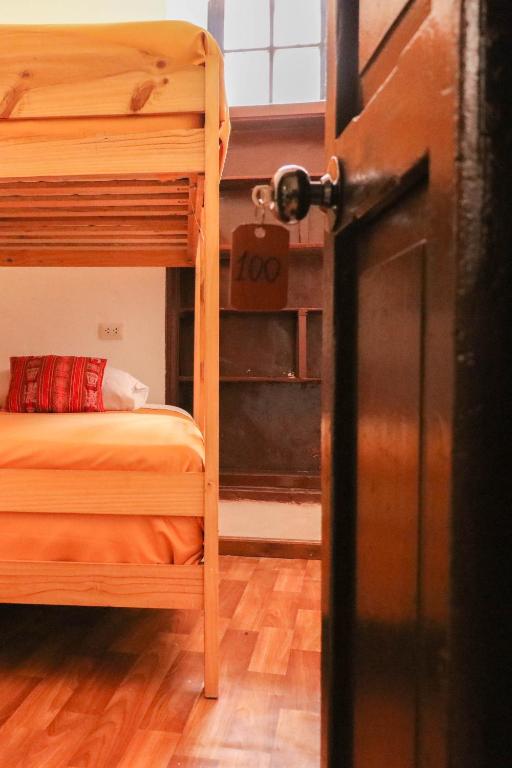 Postel nebo postele na pokoji v ubytování Millas House Cusco