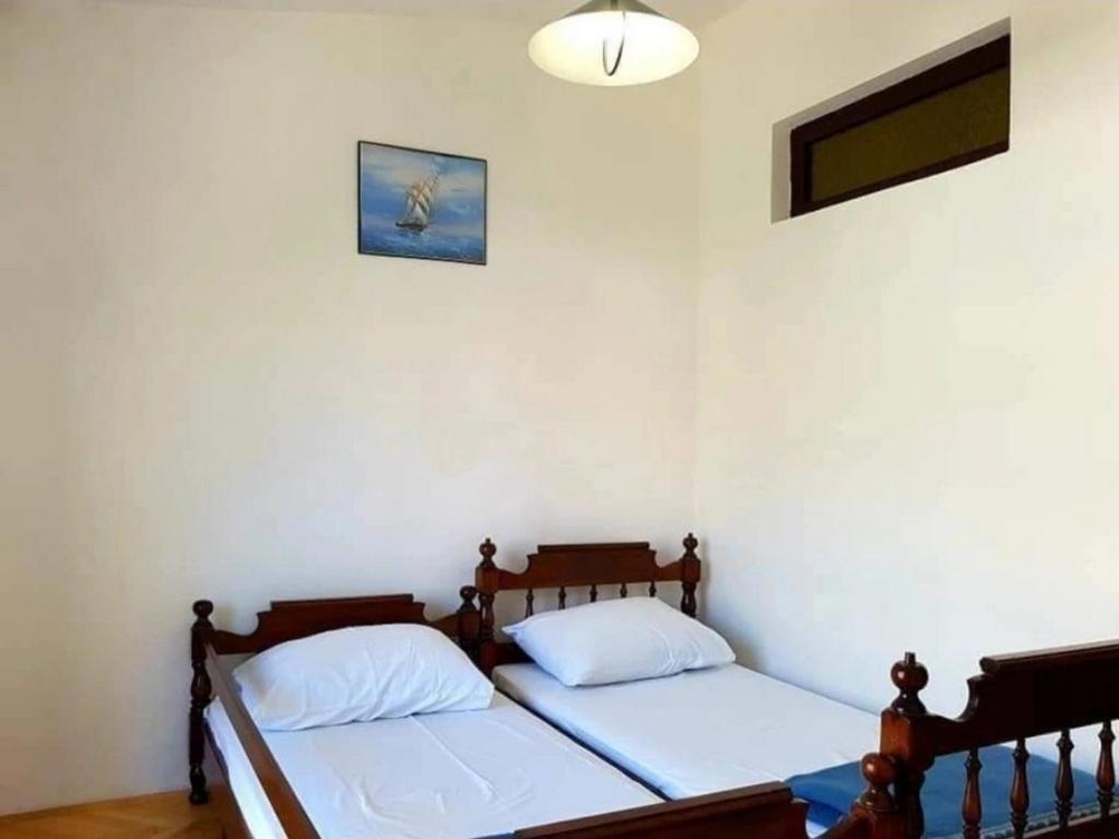 Posteľ alebo postele v izbe v ubytovaní Apartments by the sea Starigrad, Paklenica - 6621