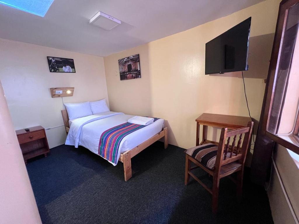 Postel nebo postele na pokoji v ubytování Eco Inn