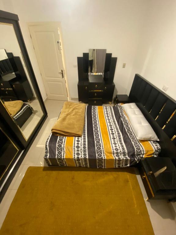 Postel nebo postele na pokoji v ubytování Madinaty vibes