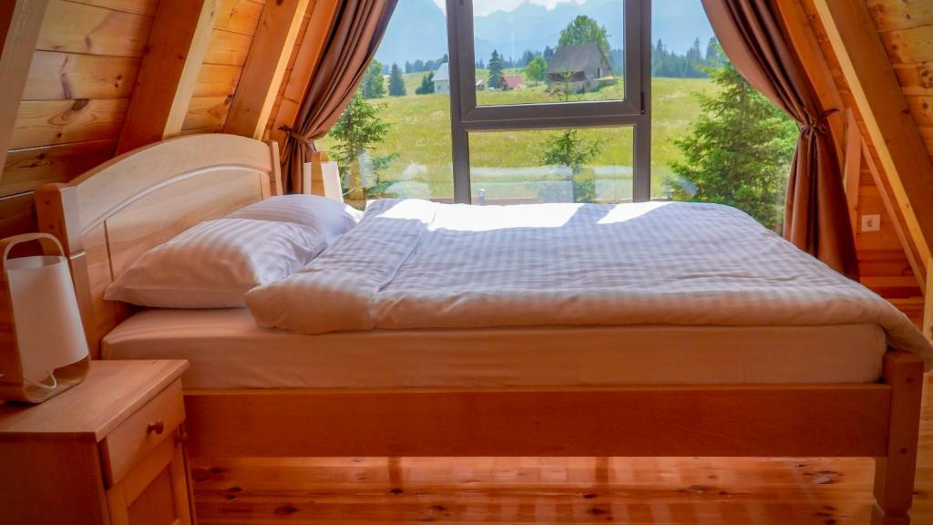 Postel nebo postele na pokoji v ubytování Villas Chardak