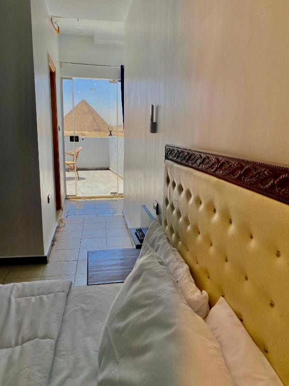 Llit o llits en una habitació de Anubis Pyramids View