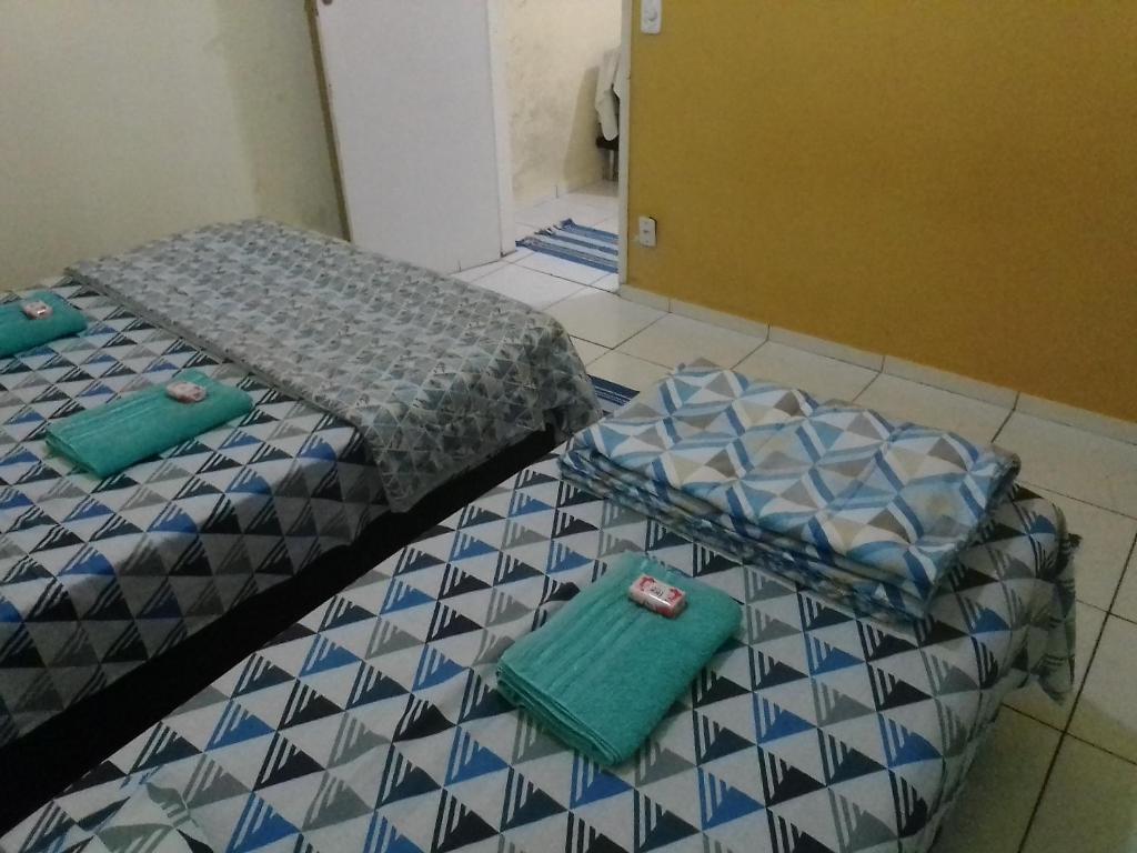 Postel nebo postele na pokoji v ubytování Pousada Jasmim Paraty