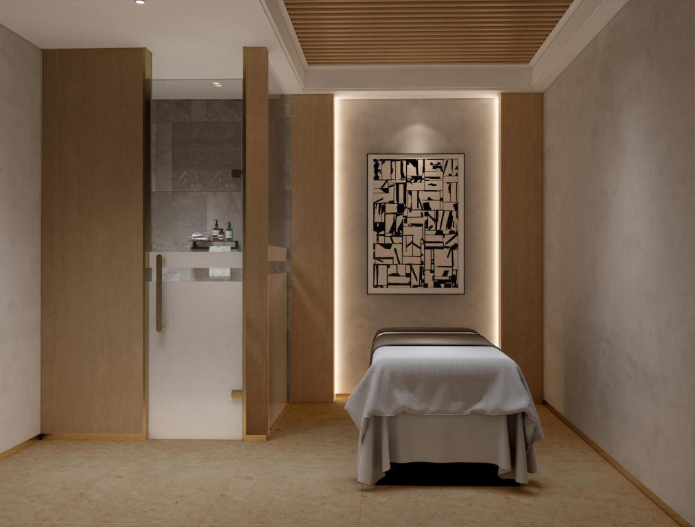 Postel nebo postele na pokoji v ubytování Crowne Plaza Huangshan Yucheng by IHG