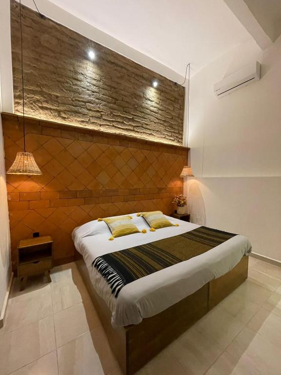Postel nebo postele na pokoji v ubytování Casa Sofi Oaxaca