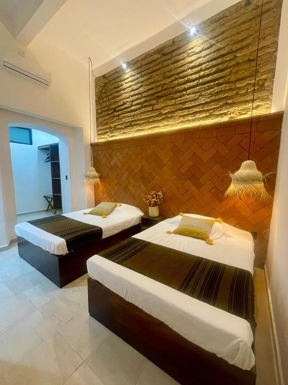 Postel nebo postele na pokoji v ubytování Casa Sofi Oaxaca