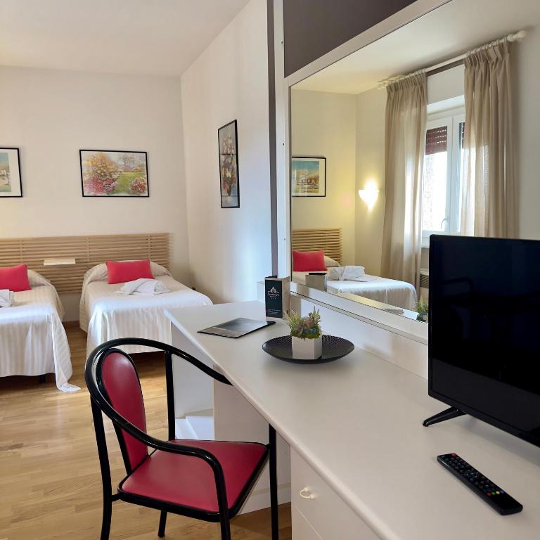 TV a/nebo společenská místnost v ubytování Hotel Quadrifoglio