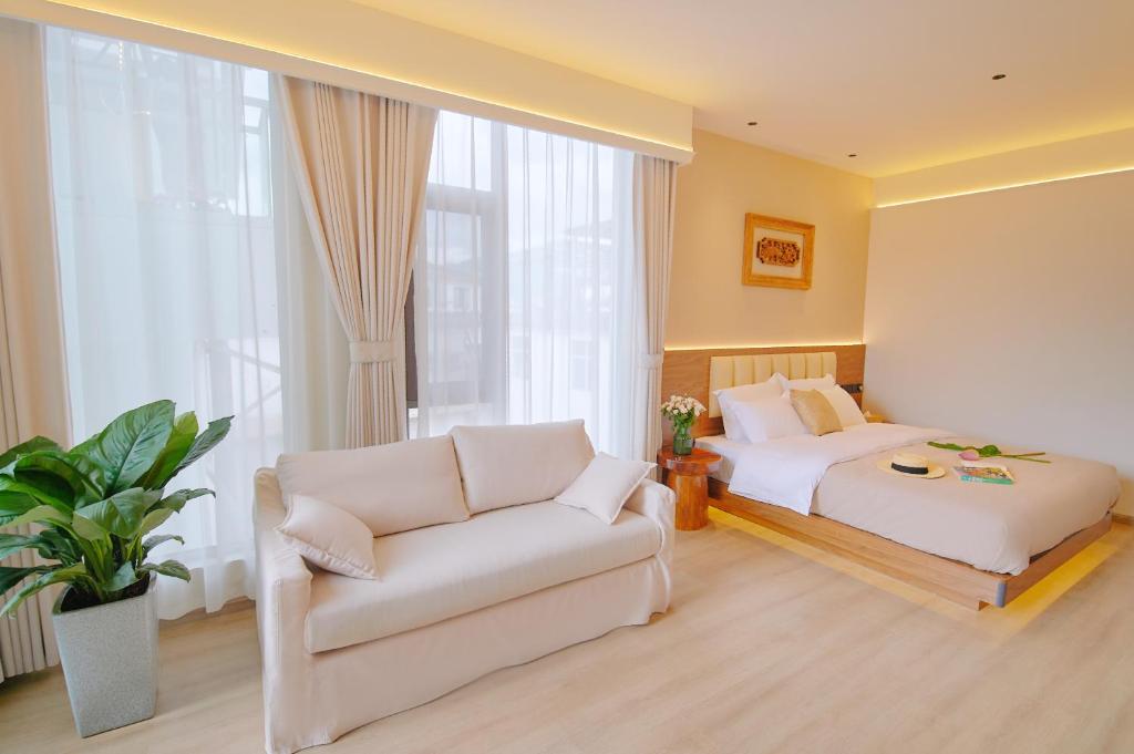 Postel nebo postele na pokoji v ubytování 夕露小榭南门机场大巴店Xiluxiaoxie MUXIN INN