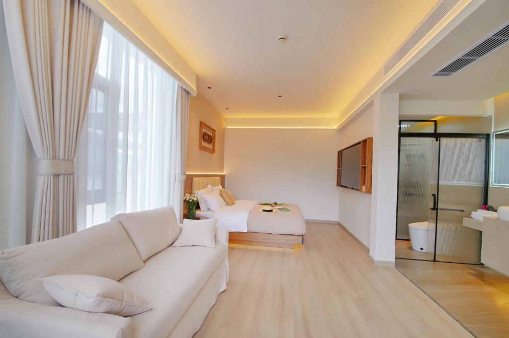 Posezení v ubytování 夕露小榭南门机场大巴店Xiluxiaoxie MUXIN INN