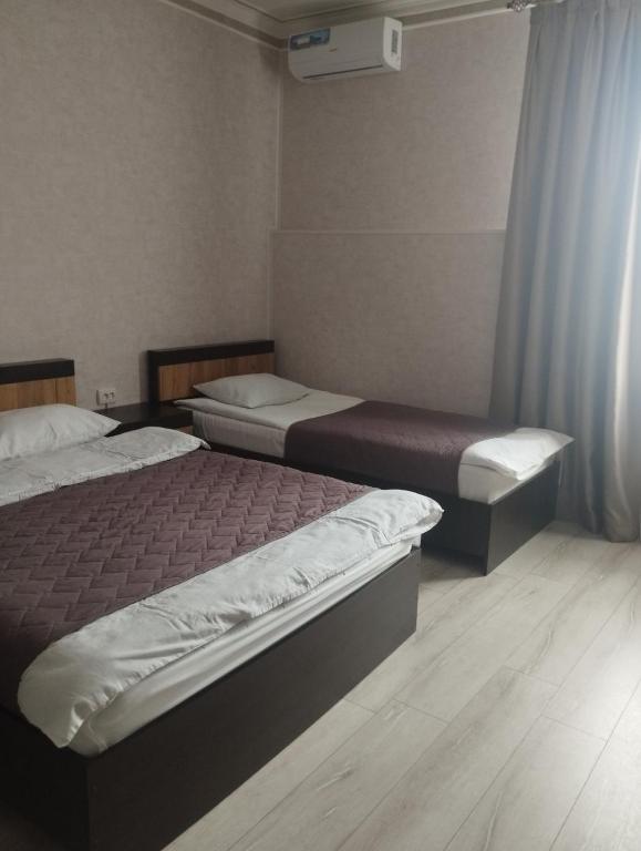 Postel nebo postele na pokoji v ubytování Bonus