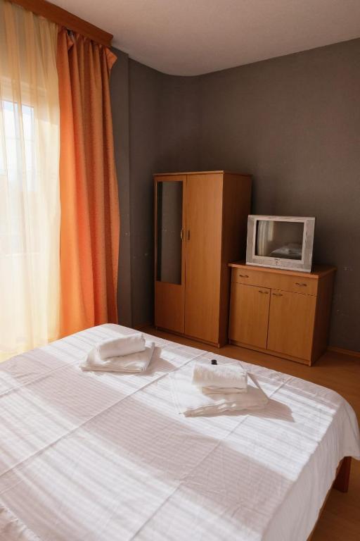Postel nebo postele na pokoji v ubytování Hotel ARISTON