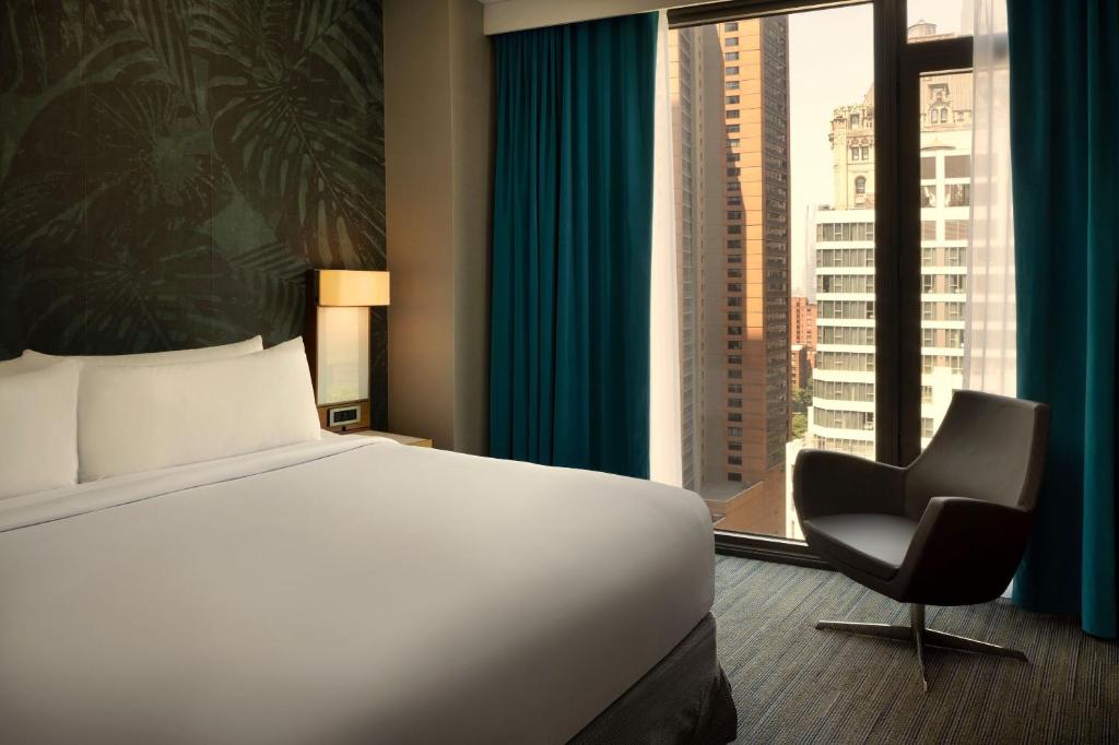 Ein Bett oder Betten in einem Zimmer der Unterkunft The Cloud One New York-Downtown, by the Motel One Group