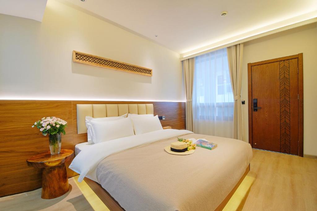 Postel nebo postele na pokoji v ubytování 夕露小榭南门机场大巴店Xiluxiaoxie MUXIN INN