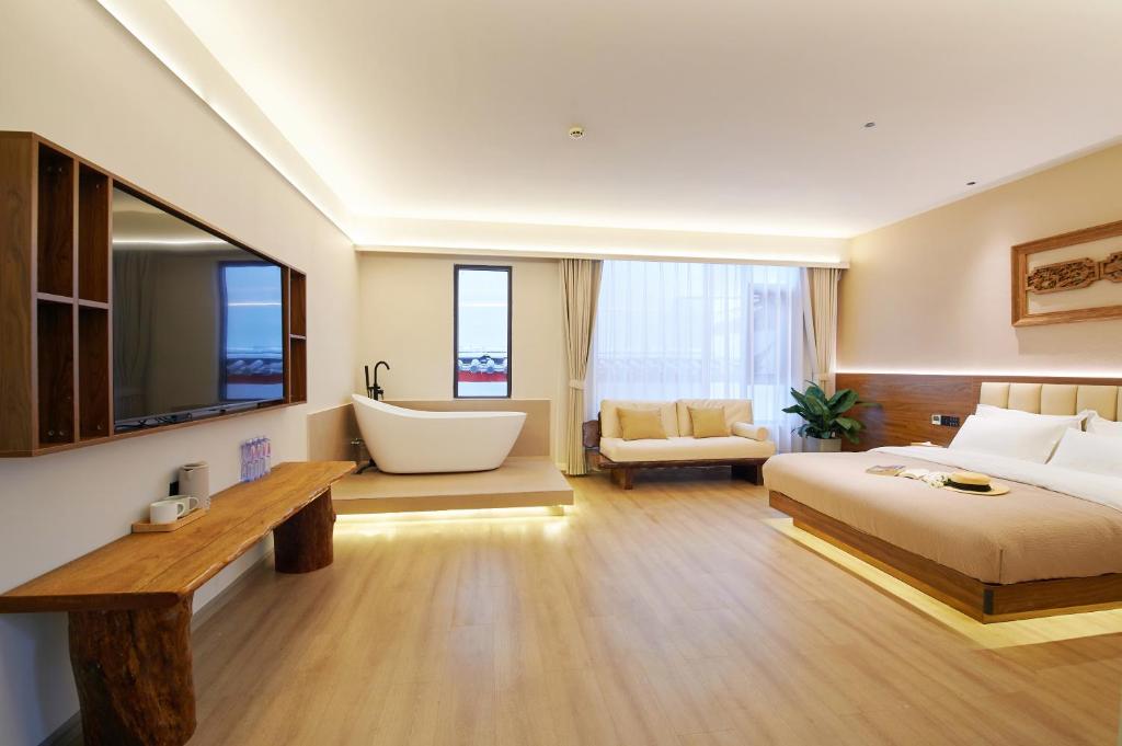 Posezení v ubytování 夕露小榭南门机场大巴店Xiluxiaoxie MUXIN INN